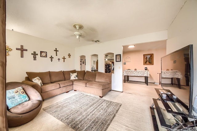 living room featuring ceiling fan