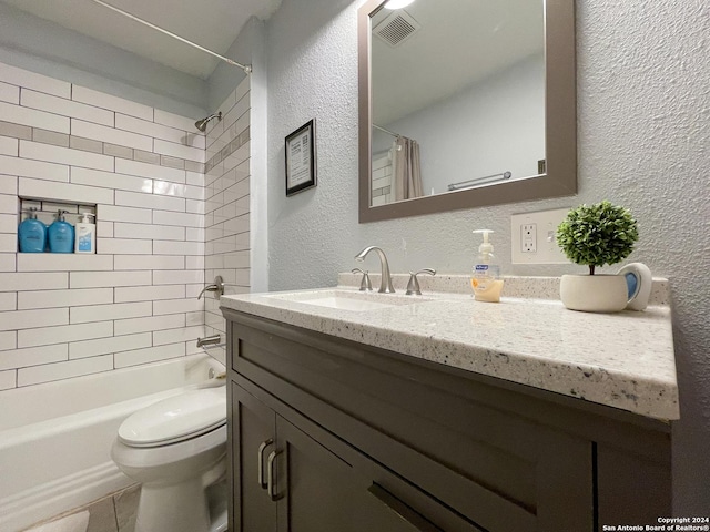 full bathroom featuring shower / bath combo, toilet, and vanity