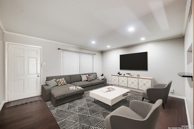 living room featuring hardwood / wood-style floors and crown molding