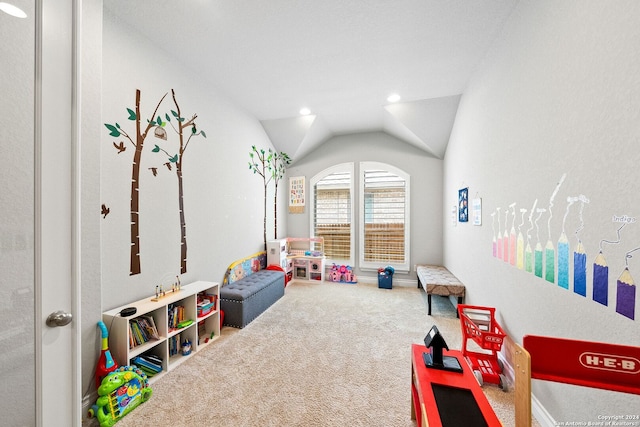 game room featuring carpet floors and lofted ceiling