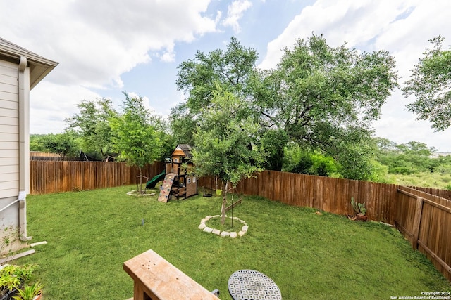 view of yard featuring a playground