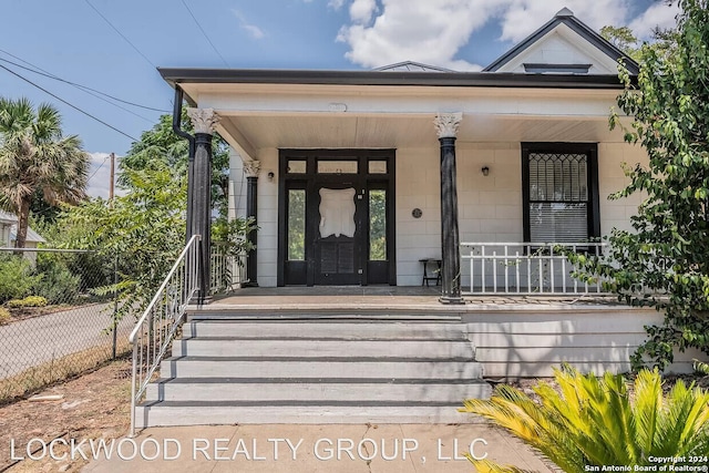 property entrance with a porch