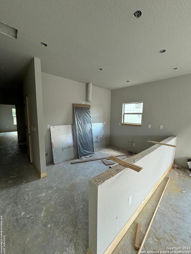 kitchen featuring a textured ceiling