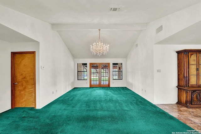 carpeted spare room with vaulted ceiling with beams and a notable chandelier