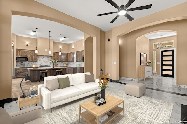 living room featuring ceiling fan