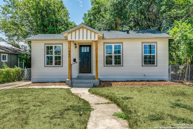 view of front of property with a front lawn