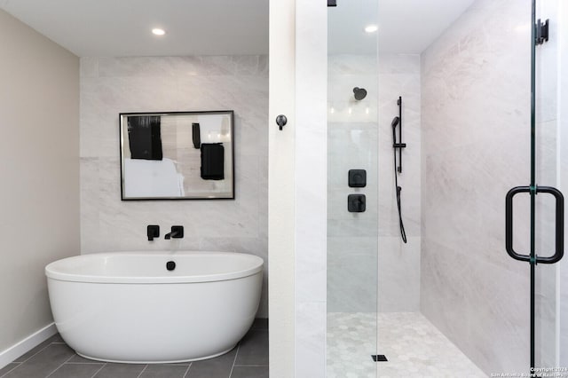 bathroom featuring tile patterned floors and plus walk in shower