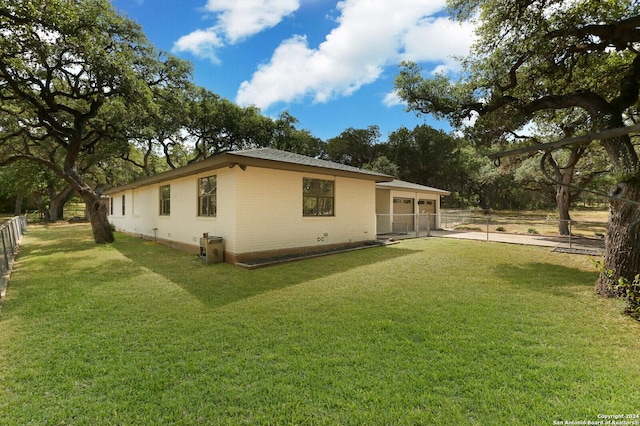 view of home's exterior featuring a lawn