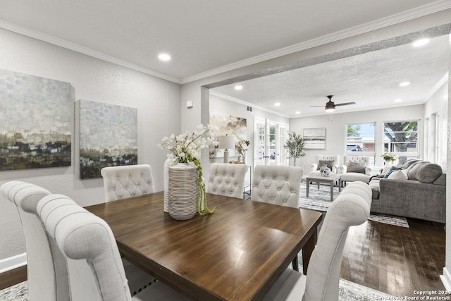 dining area featuring ceiling fan, crown molding, and wood-type flooring