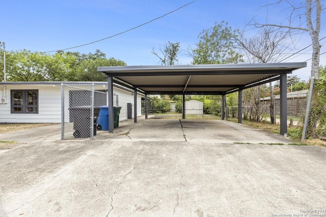 view of vehicle parking featuring a carport