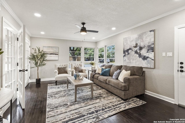 living room with french doors, ornamental molding, a textured ceiling, ceiling fan, and dark hardwood / wood-style floors