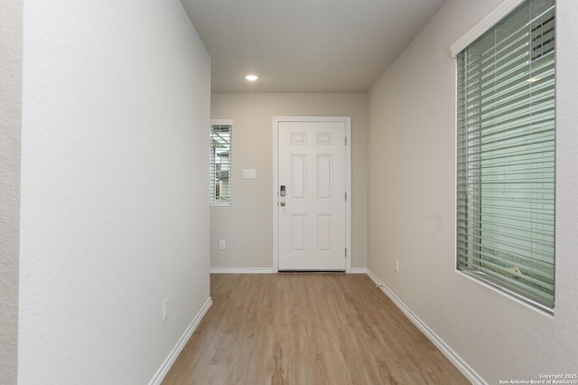 hall featuring light hardwood / wood-style floors