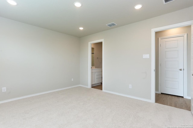 empty room with light carpet