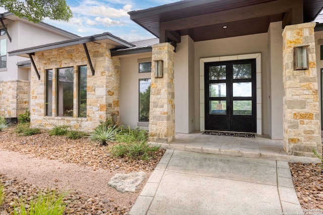 view of exterior entry with french doors