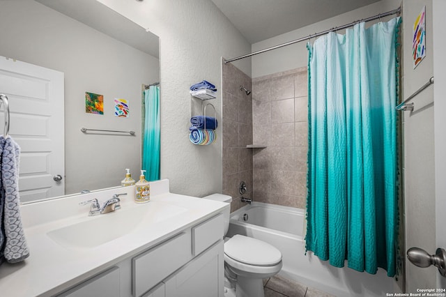 full bathroom featuring shower / tub combo, vanity, and toilet