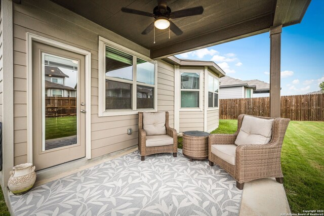 view of patio with ceiling fan