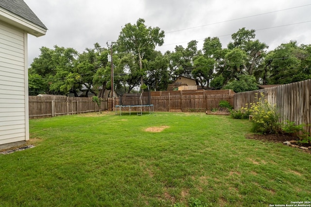 view of yard featuring a trampoline