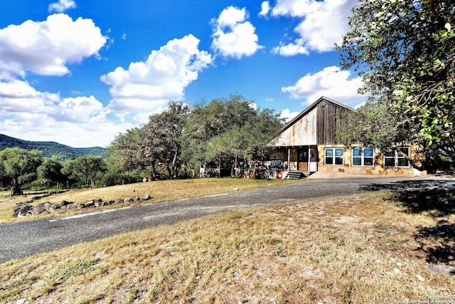 exterior space featuring a mountain view