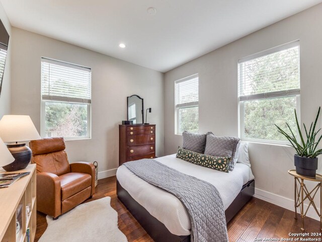 bedroom featuring dark hardwood / wood-style floors