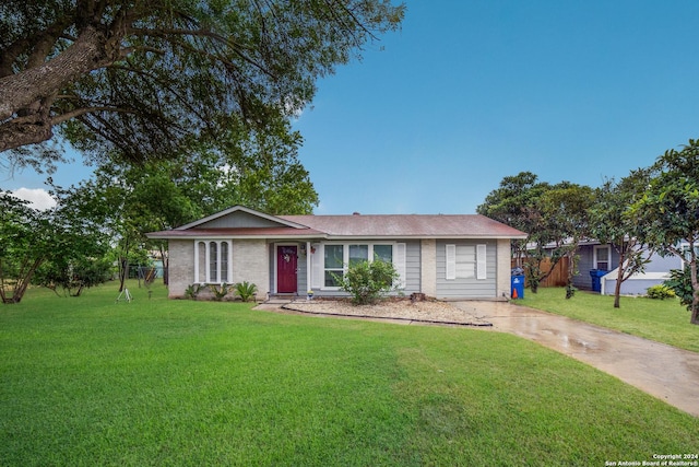 ranch-style house with a front yard