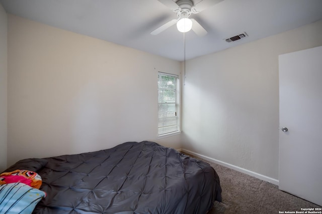 unfurnished bedroom with carpet flooring and ceiling fan