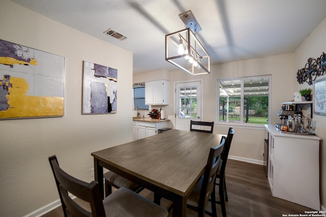 dining room featuring dark hardwood / wood-style floors