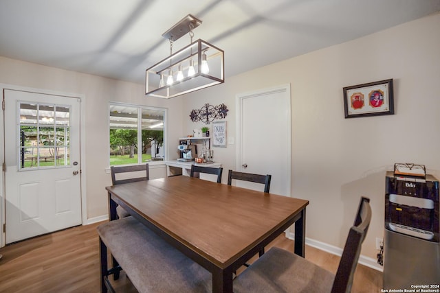 dining area featuring light wood-type flooring