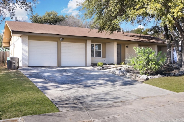 single story home with a garage