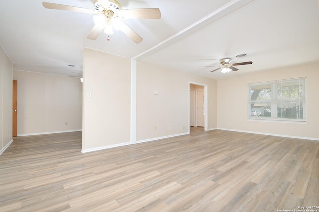 empty room featuring light wood-type flooring and ceiling fan