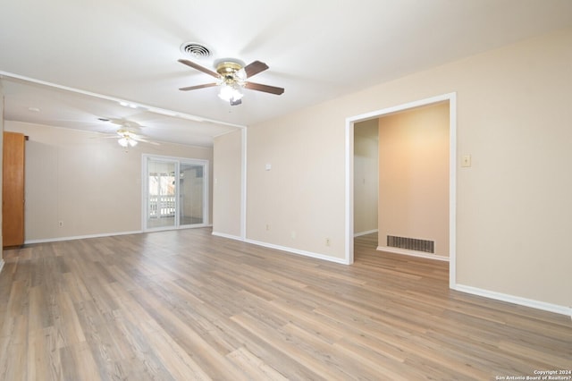 unfurnished room with light hardwood / wood-style floors and ceiling fan