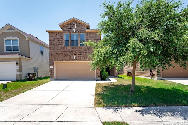 view of front of property with a garage and a front lawn