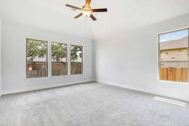 unfurnished room with ceiling fan and carpet flooring