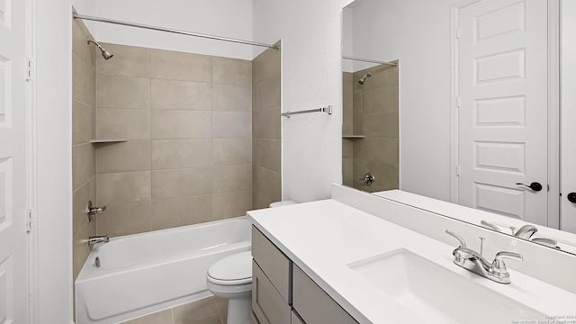 full bath with bathing tub / shower combination, vanity, toilet, and tile patterned flooring