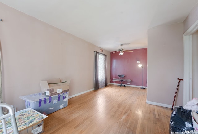 interior space with light hardwood / wood-style floors and ceiling fan