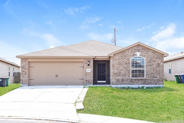 ranch-style house with a front yard and a garage