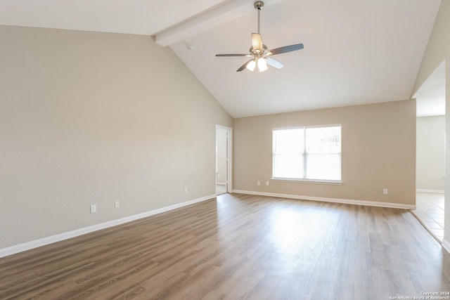 unfurnished room featuring beamed ceiling, ceiling fan, hardwood / wood-style floors, and high vaulted ceiling