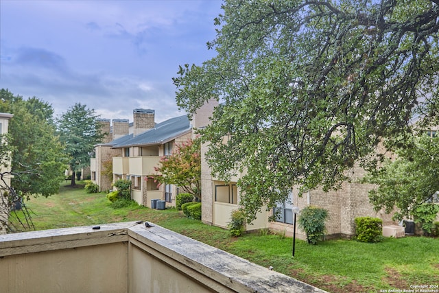 exterior space with a yard