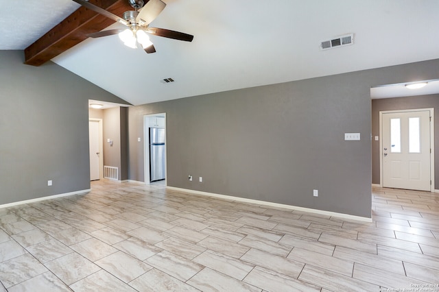 spare room with ceiling fan, lofted ceiling with beams, and light tile flooring