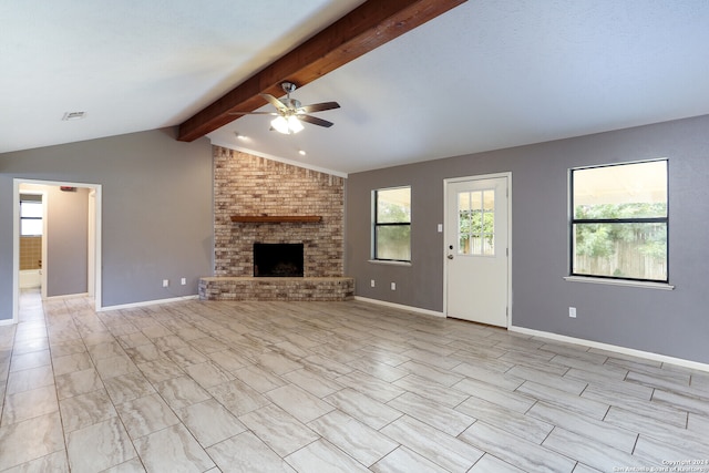 unfurnished living room with a fireplace, vaulted ceiling with beams, light tile floors, and ceiling fan