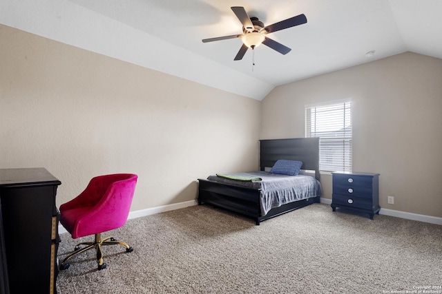 carpeted bedroom featuring ceiling fan and vaulted ceiling