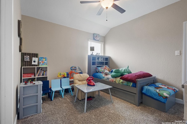 rec room with ceiling fan, lofted ceiling, and carpet