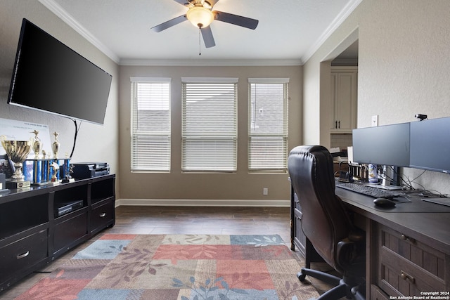 home office with ceiling fan, dark wood-type flooring, and crown molding