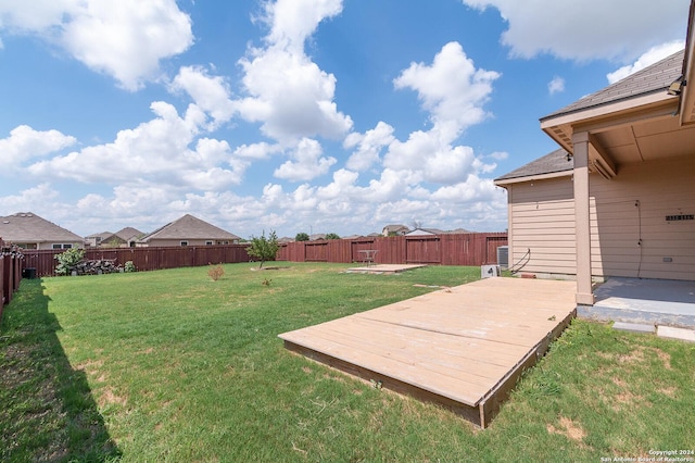 view of yard with a wooden deck