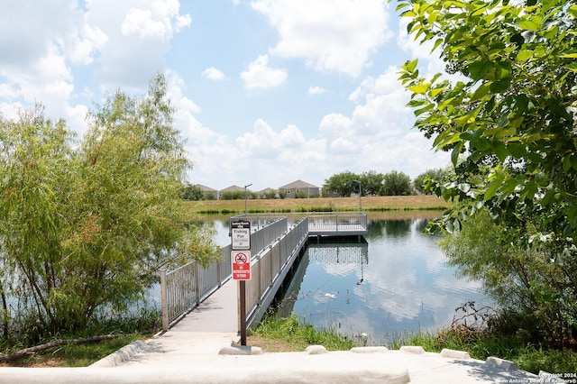 view of dock with a water view