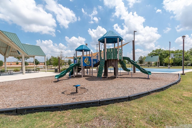 view of jungle gym featuring a yard