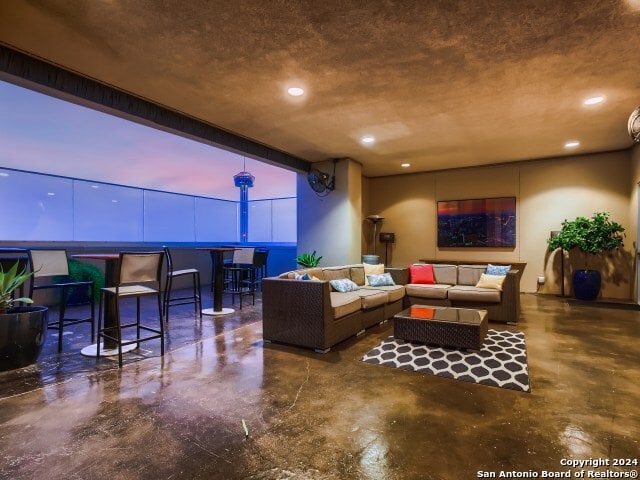 215 Center St Unit 307, San Antonio, TX 78202 - living room featuring finished concrete flooring
