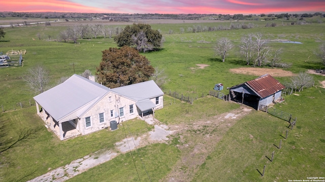 aerial view at dusk with a rural view