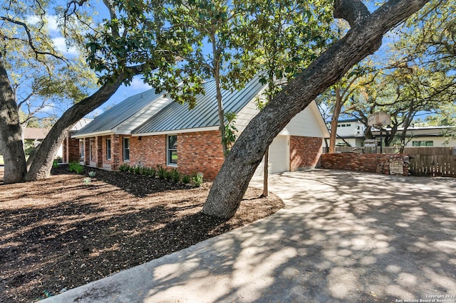 view of home's exterior with a garage