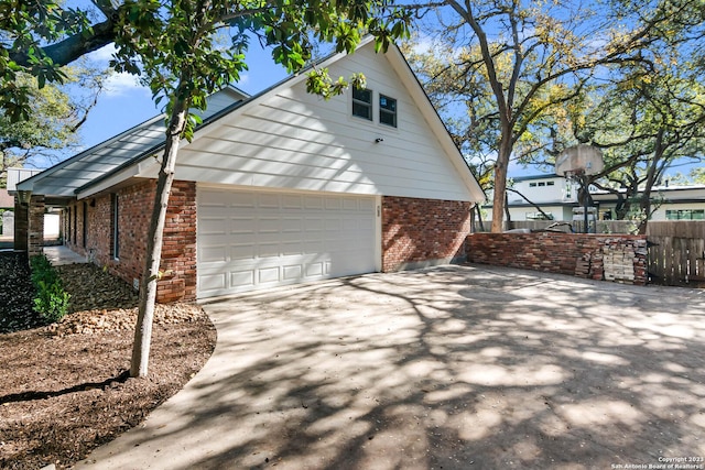 view of property exterior with a garage