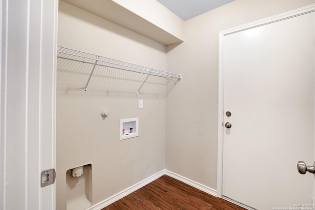 laundry room featuring washer hookup, dark hardwood / wood-style floors, and hookup for a gas dryer